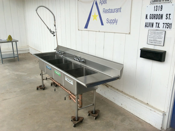 Three Compartment Stainless Steel Sink with Pull out Sprayer, drainboards, and backsplash board.